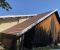 Réfection de toiture avec rivage en zinc naturel et bardage en bois étuvé de la gamme Authentique de Solibois a Levier
